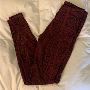 Red snakeskin leggings